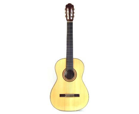 Nogumi Classical Guitar, model TG-D, with Indian rosewood back and sides, with hard case.65cm scale length 