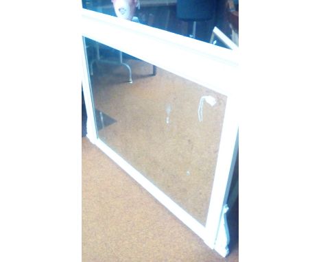 Large over-mantel mirror with swag decorated frieze