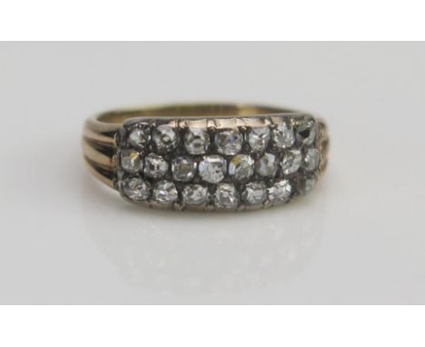 An Antique Old Cut Diamond Three Row Ring in a precious yellow metal setting, c. 14.8x7mm head, size K, KEE tests as 18ct wit