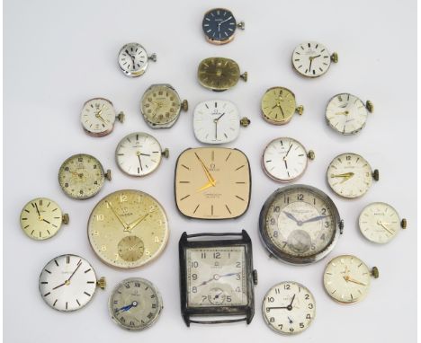 A Selection of OMEGA, ROLEX, JAEGER-LeCOULTRE, ZENITH and LONGINES Movements and Dials including an OMEGA silver cased tank w