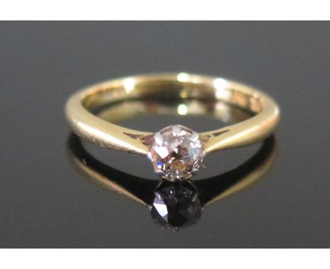 A Modern 18ct Gold and Diamond Solitaire Ring platinum claw set c. 4.87mm old cut, size R.5, stamped 18CT PLAT, 3.76g 