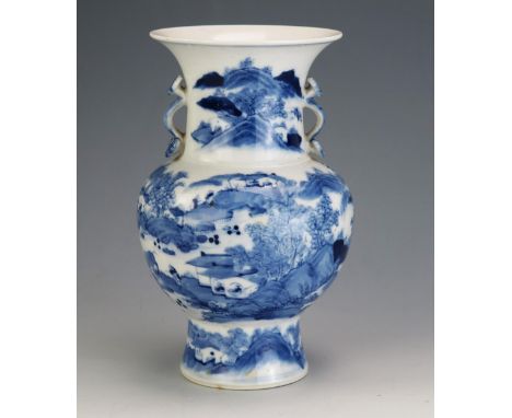 A Chinese blue and white vase of baluster form, decorated with figures in an extensive landscape and with ruyi scepter handle