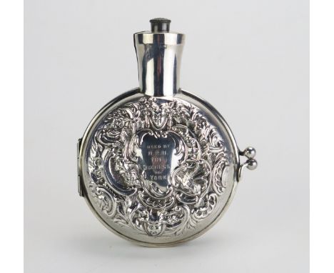 A Victorian silver scent bottle holder, maker William Comyns &amp; Sons, London, 1899, inscribed, "Used by HRH The Duchess of