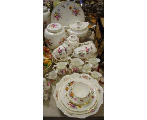 A Royal Crown Derby Posies pattern tea set, including large teapot, biscuit barrel, tea caddy, milk jugs, sugar bowls, cups, 