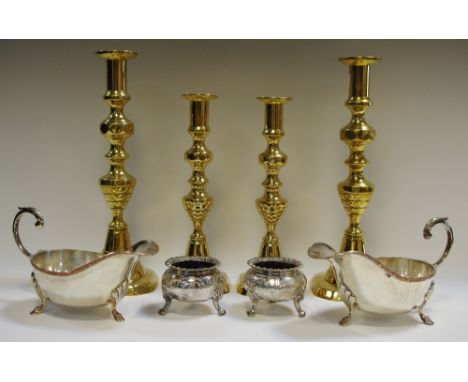 A pair of large 19th century brass ejector table candlestick; another pair; a pair of George III style EP on copper sauce boa