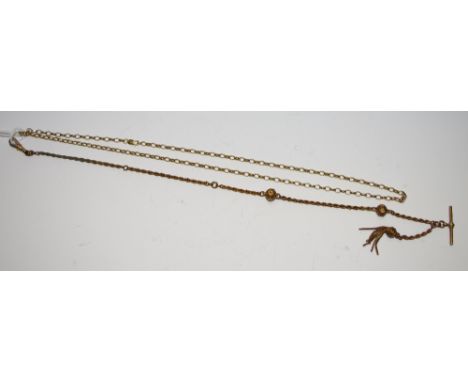 A 9ct gold diamond cut belcher necklace 10.3g; a yellow metal Albert chain and T bar.