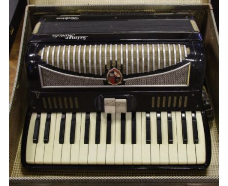 A Selmer Invicta Moderna accordion with black body serial 7570, cased.