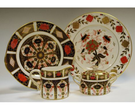 Royal Crown Derby - 1128 Imari, a twin handle sucrier, cream jug, dished dessert plate,  another 8687 pattern part seconds (4