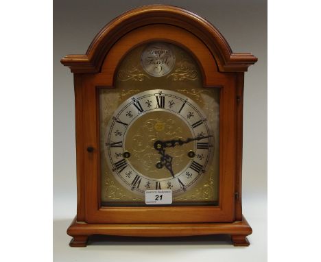 A walnut bracket clock, Tempus Fugit.