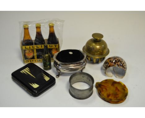 A Victorian silver boat shaped pin cushion, Sheffield 1898; a set of 3 miniature "Lilliput" Guinness bottles; a Guinness "Tre