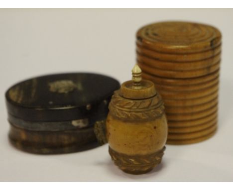 A 19th century vegetable ivory sewing tape measure; a silver mounted horn snuff box; a turned green counter box (3)