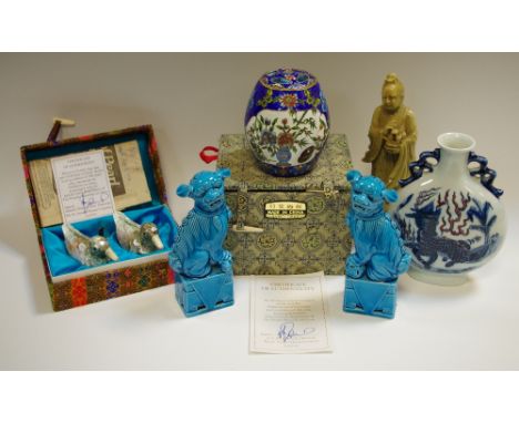 A Pair of Chinese Turquoise temple lions, a pair of mother of pearl ducks, a Chinese moon flask, a closissonne jar and cover.