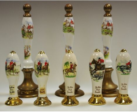 Miniature bar pump handles depicting hunting scenes.