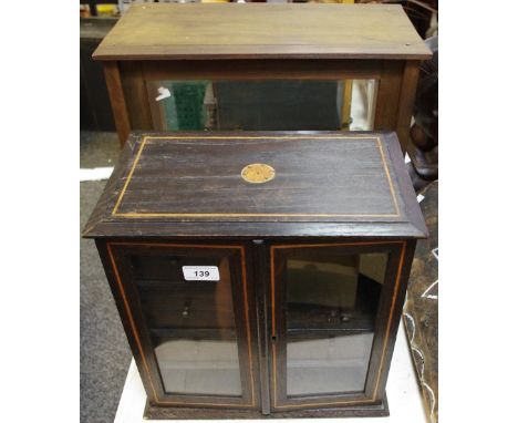 A an early 20th century mahogany tobacco cabinet, two glazed doors enclosing fitted drawers; a apothecary scales glass cabine