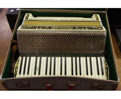 A Hohner Verdi III accordion serial no. 134599 cased.