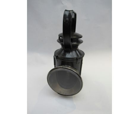 A three aspect hand lamp with brass and ceramic burner stamped B.R