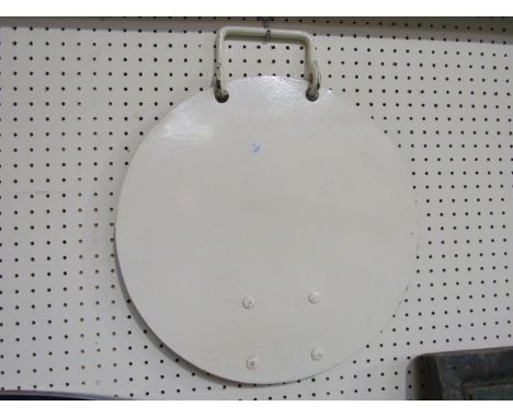 A metal locomotive head code disc with fixing bracket