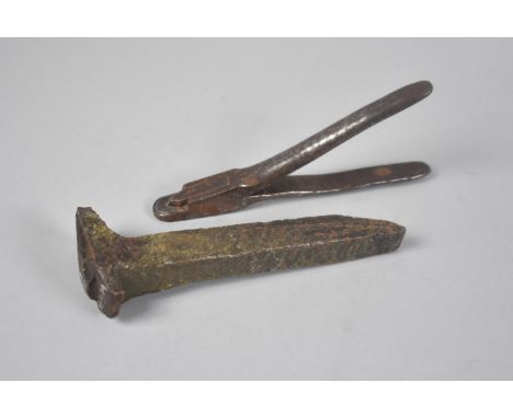 A LMS Ticket Punch and Early Forged Railway Spike from the Tal-Y-Llyn Railway, c.1865/70