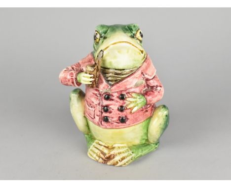 A Continental Ceramic Novelty Pot in the Form of a Anthropomorphic Toad Dressed in a Pink Jacket with Pipe, Stamped Under, 15