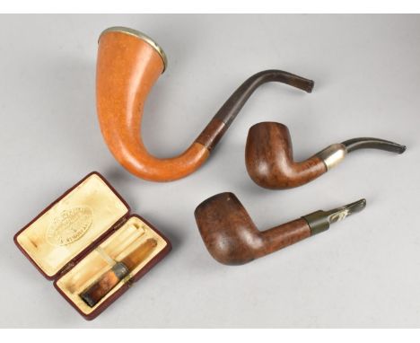 Three Vintage Pipes and a Cased Amber Cheroot Holder by Allen and Rice, Small Briar Pipe with Silver Band
