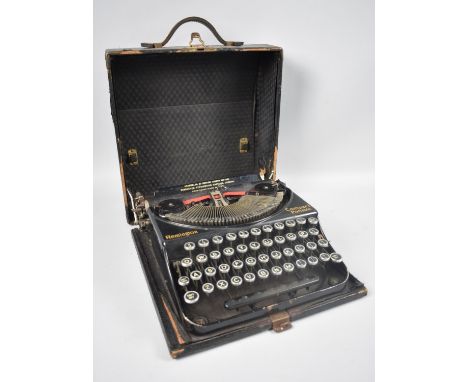 A Vintage Remington Compact Portable Typewriter