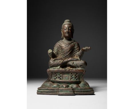 COPPER ALLOY FIGURE OF SHAKYAMUNI SWAT VALLEY, 8TH CENTURY 八世紀 斯瓦特 銅鑄釋迦摩尼佛座像 cast seated in padmasana on a slightly waisted p