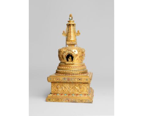 LARGE GILT BRONZE STUPA 19TH-20TH CENTURY 十九至二十世紀 銅鎏金嵌珊瑚綠松石尊勝塔 the reliquary cast on a waisted square throne decorated in rel