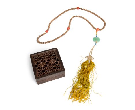AGARWOOD NECKLACE 沉香木念珠 comprising one hundred and eight agarwood beads spaced with red beads and adorned with jade and tasse