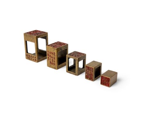 SET OF FIVE BRONZE SEALS 銅鑄題詩套印（一組五件） comprising five rectangular seals, cleverly arranged with one fitting into another, in 