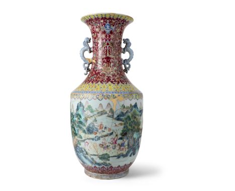 LARGE FAMILLE ROSE 'FOREIGN TRIBUTE BEARERS' VASE QING DYNASTY, QIANLONG MARK, 18TH-19TH CENTURY 清 乾隆款 粉彩胭脂紫地通景進寶圖螭龍耳大賞瓶 the 