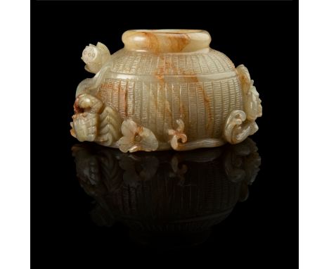 CELADON JADE 'FISH CAGE' BRUSH WASHER QING DYNASTY, 19TH CENTURY 清 青玉帶皮雕魚籠蝦蟹筆洗 carved as an oval bamboo-woven fish cage, the 