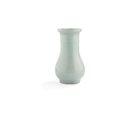 LONGQUAN CELADON-GLAZED VASE SOUTHERN SONG DYNASTY 南宋 龍泉青釉瓶 the pear-shaped body supported on a slightly tapered foot and ris