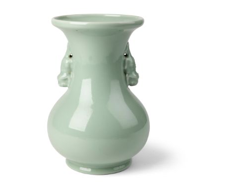 CELADON-GLAZED 'MAKARA' HANDLED VASE QING DYNASTY, YONGZHENG MARK BUT 19TH CENTURY 清 雍正款 粉青釉雙獸耳瓶 the bulbous body supported o