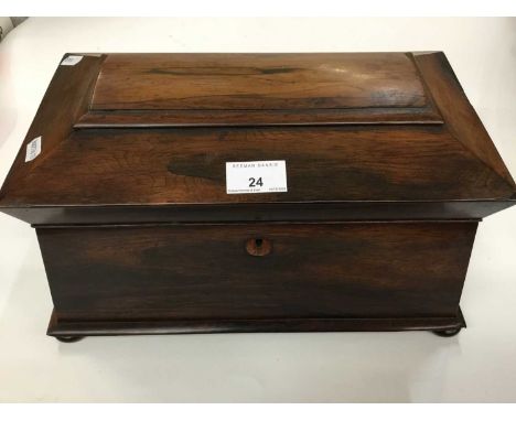 Early Victorian mahogany sarcophagus shaped tea caddy with twin canisters and central mixing bowl