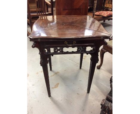 Early 20th century mahogany envelope top card table with pierced carved decoration. 61cm wide