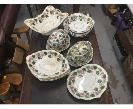 Early 19th century Derby porcelain part desert service, hand decorated with roses and ivyCondition report: Some gilt and enam