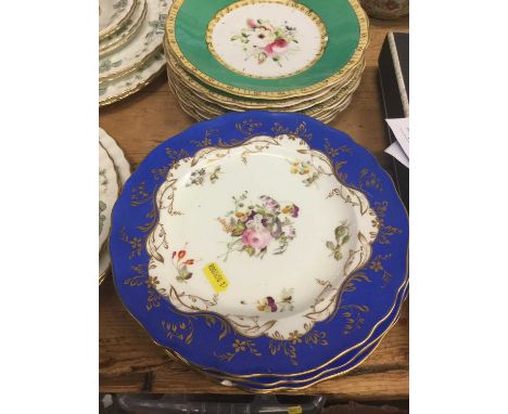 Seventeen Victorian porcelain dessert plates with polychrome painted floral decoration on green ground together with a set of