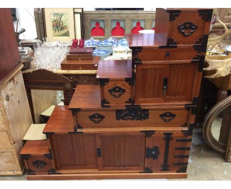 Korean step chest with draws, cupboards and metal strap work. 130cm wide x 40cm deep x 127cm high 