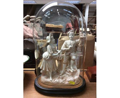 Ceramic figure group under glass dome