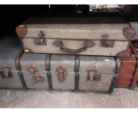 Vintage canvas and brown leather suit case, vintage cabin trunk and one other vintage case