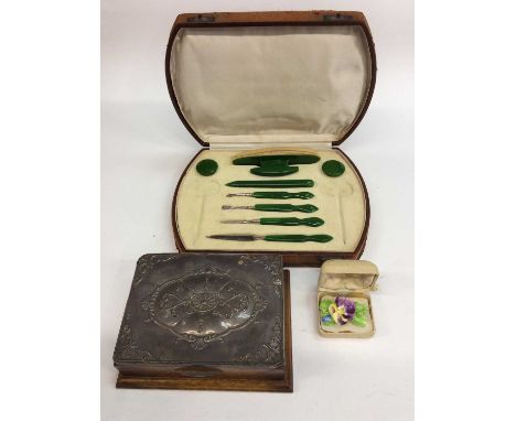 Silver topped wooden jewellery box, ceramic flower brooch and a manicure set in case