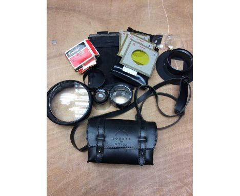 Bogner for Leica black leather camera case, together with camera accessories