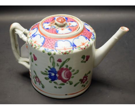 An 18th century Chinese Export famille rose porcelain teapot, the drum painted with blossoming flowers and foliage in tones o