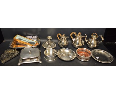 A Victorian silver King's pattern butter knife, Edinburgh 1878; an EPNS swing handled basket; three piece tea and hot water s