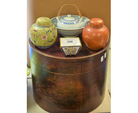 A Chinese ovoid ginger jar and cover, applied in gold on a russet ground, original wax seal in place, printed marks in green,