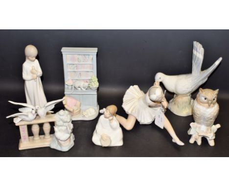 Ceramics - a Nao figure of a seated angel; a Nao figure of a young girl; a Lladro figure of a ballerina; others, similar (7)