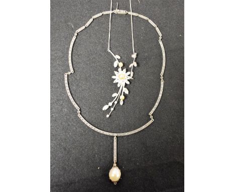 An Art Deco silver marcasite and pearl set necklace; another, floral paste (2)