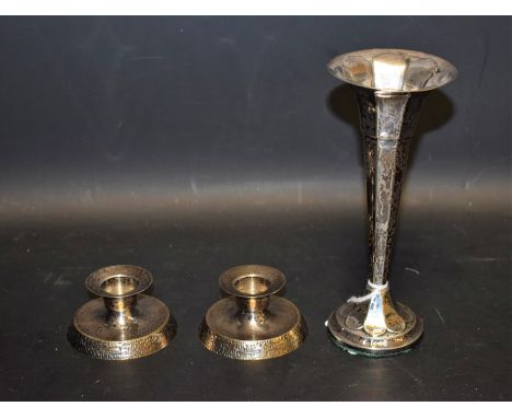 A pair of candlesticks, compressed form, PVM London 1986; a silver trumpet bud vase, Sheffield 1917 (3)