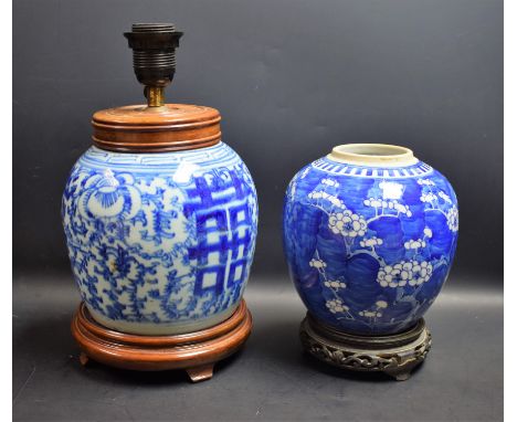 A Chinese ovoid ginger jar, painted in tones of underglaze blue with blossoming prunus on a ground of cracked ice, 17cm high,