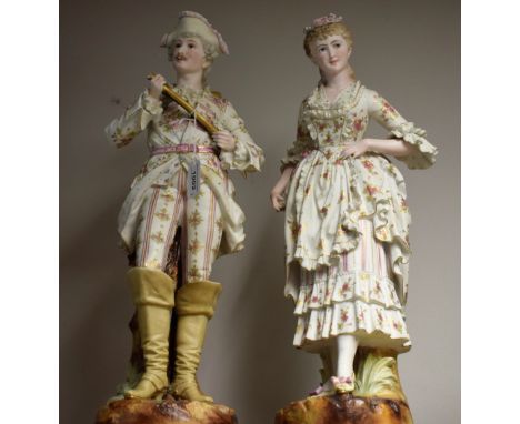 A pair of early 19th century French bisque figures, Horn Player and Companion, impressed and painted marks, 52cm high (2)